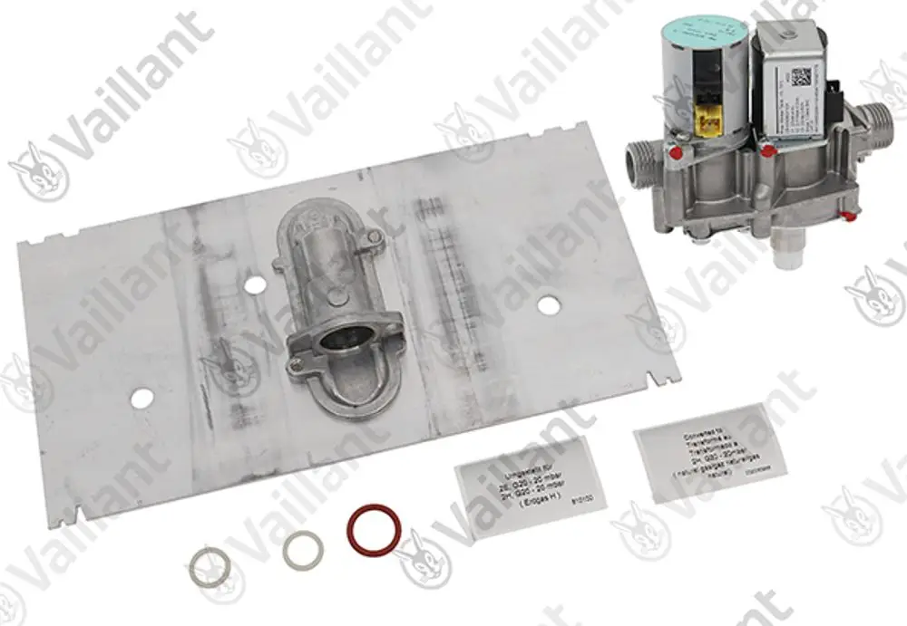 Vaillant Umstellsatz mit Metallplatte, einer Ventileinheit und Dichtungen in verschiedenen Größen, zur Verwendung in Heizungsanwendungen.